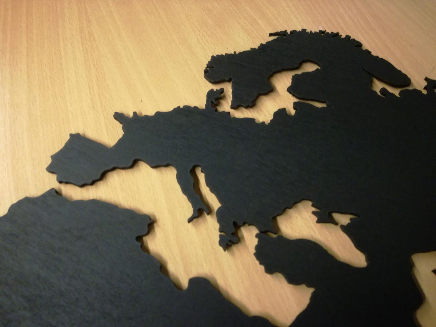 Houten wereldkaart