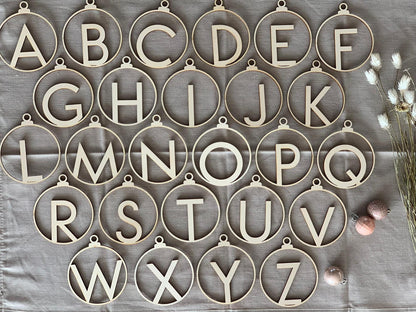 Wooden Christmas bauble with letter
