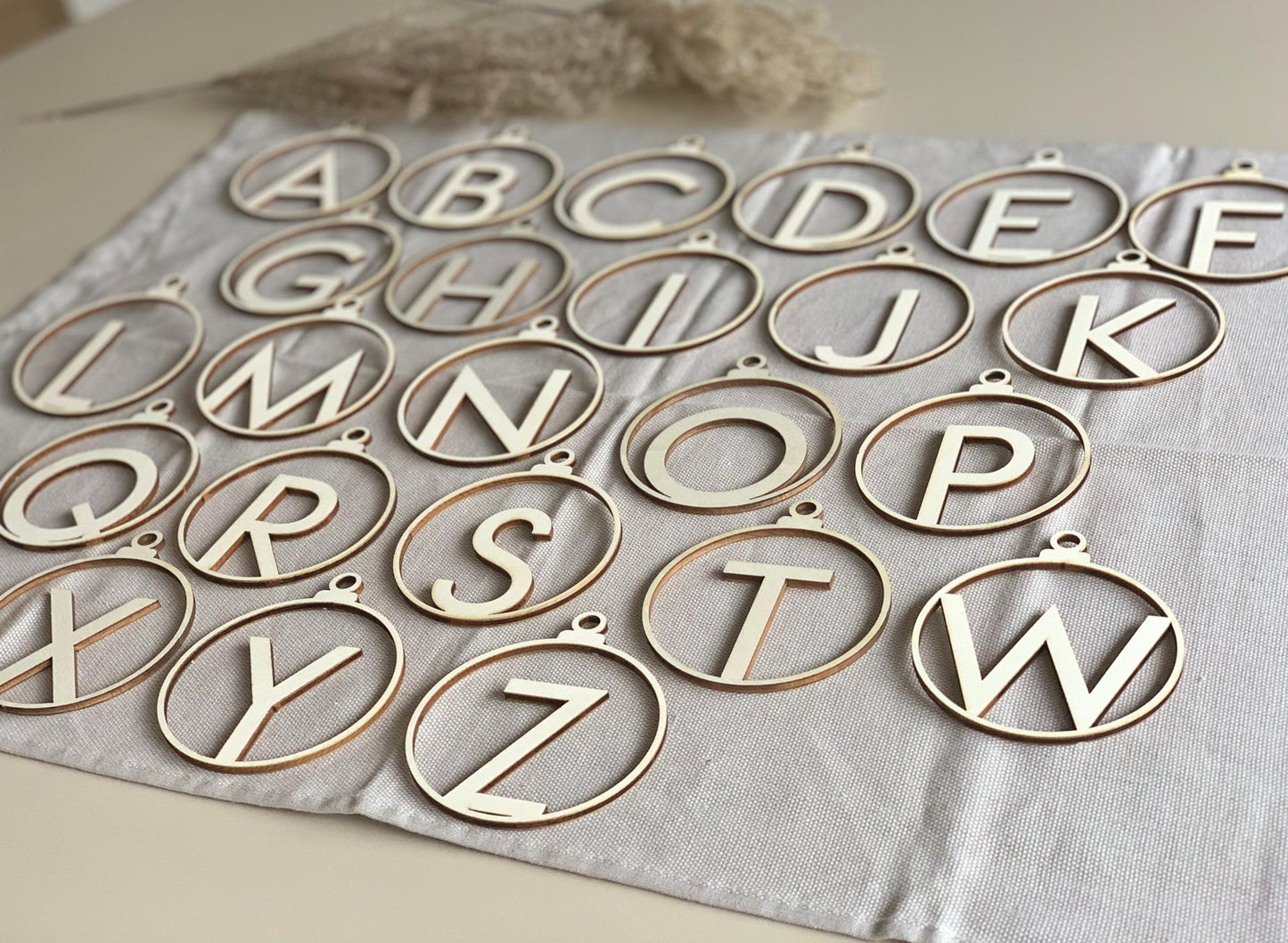 Wooden Christmas bauble with letter